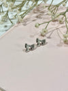 Silver bow Cutie earrings